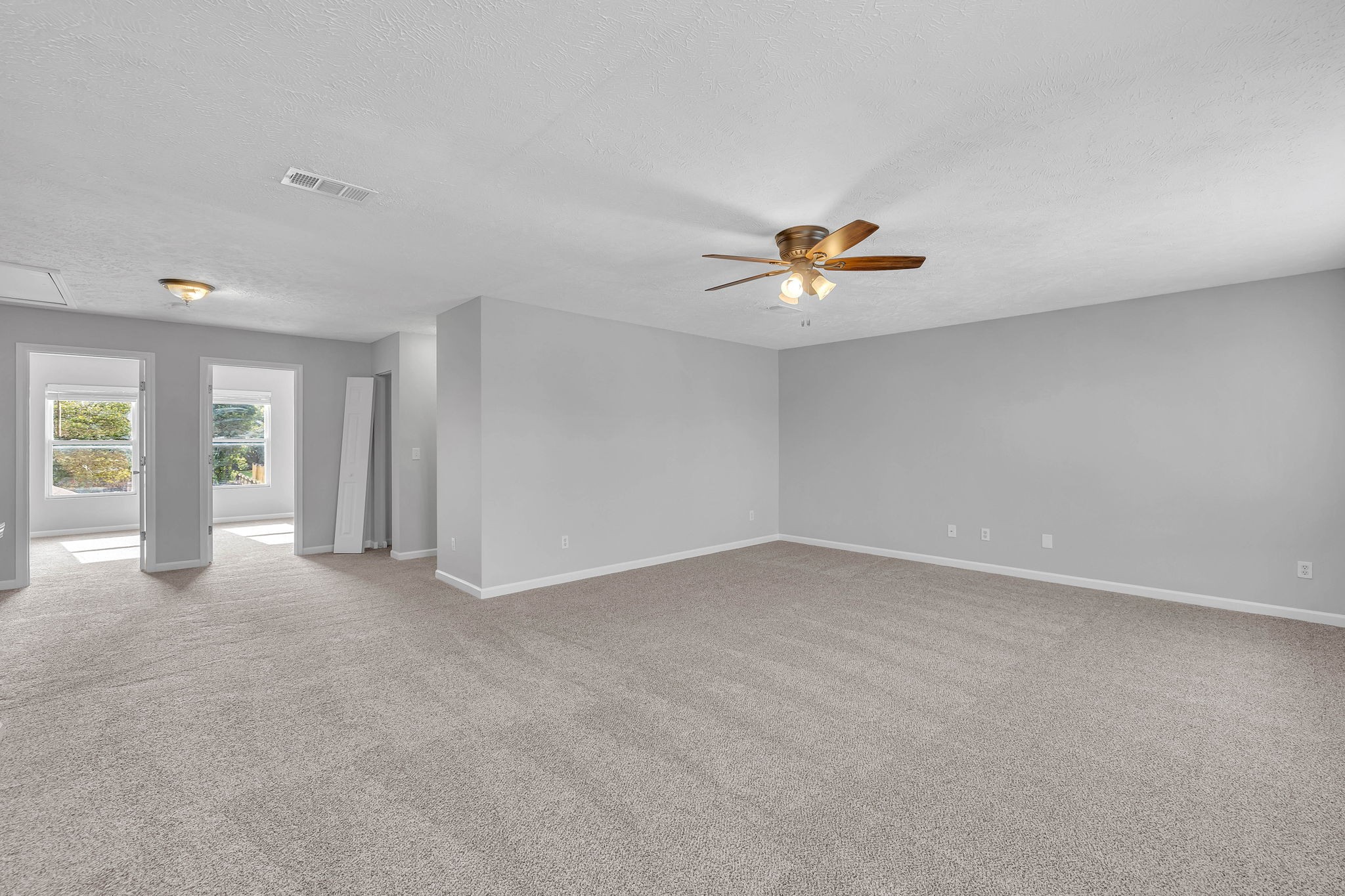 3418 Blaze Drive Murfreesboro, TN 37128 - Photo 32 of 46 wooden floor in an empty room with a window