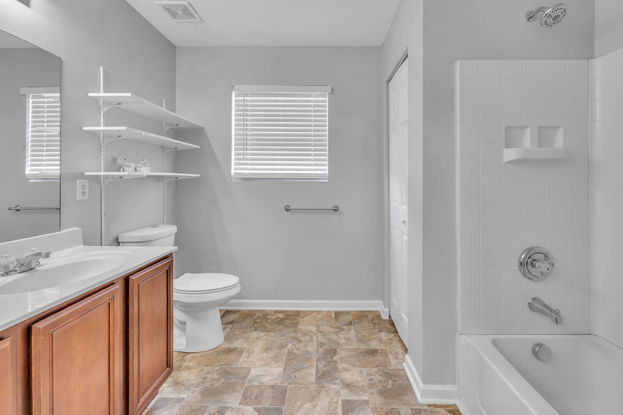 3418 Blaze Drive Murfreesboro, TN 37128 - Photo 35 of 46 a bathroom with a sink a toilet and shower