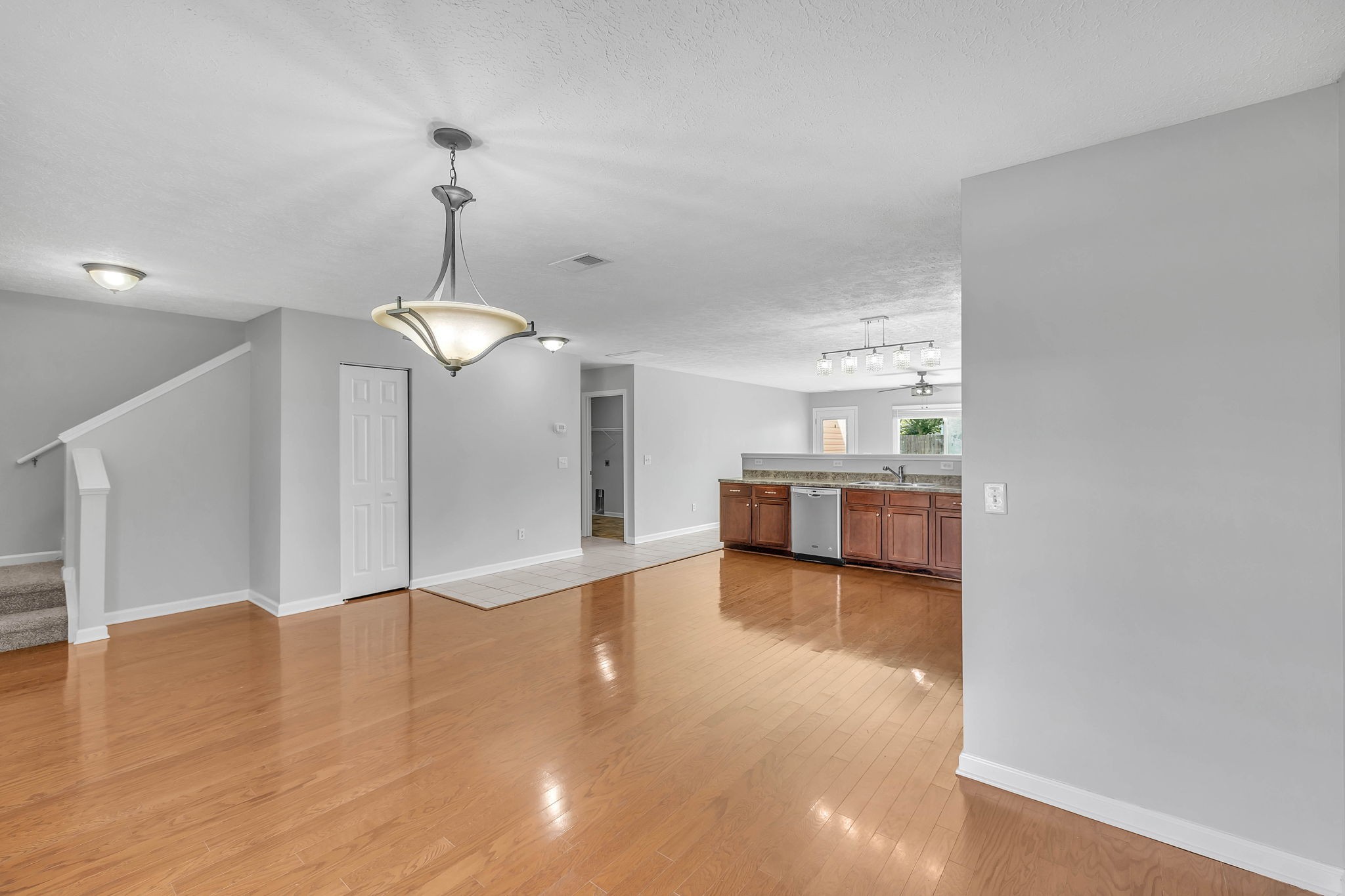 3418 Blaze Drive Murfreesboro, TN 37128 - Photo 5 of 46 a view of a room with window hardwood floor and staircase