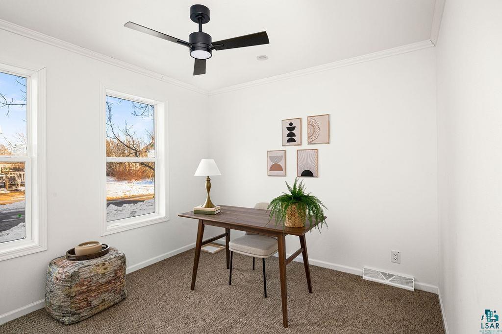 415 Cumming Avenue Superior, WI 54880 - Photo 15 of 26 Home office featuring dark colored carpet, ceiling fan, and crown molding