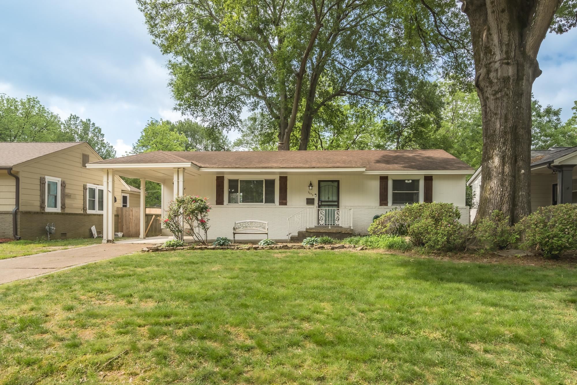 5003 Sequoia Road Memphis, TN 38117 - Photo 2 of 15 a front view of house with yard and green space