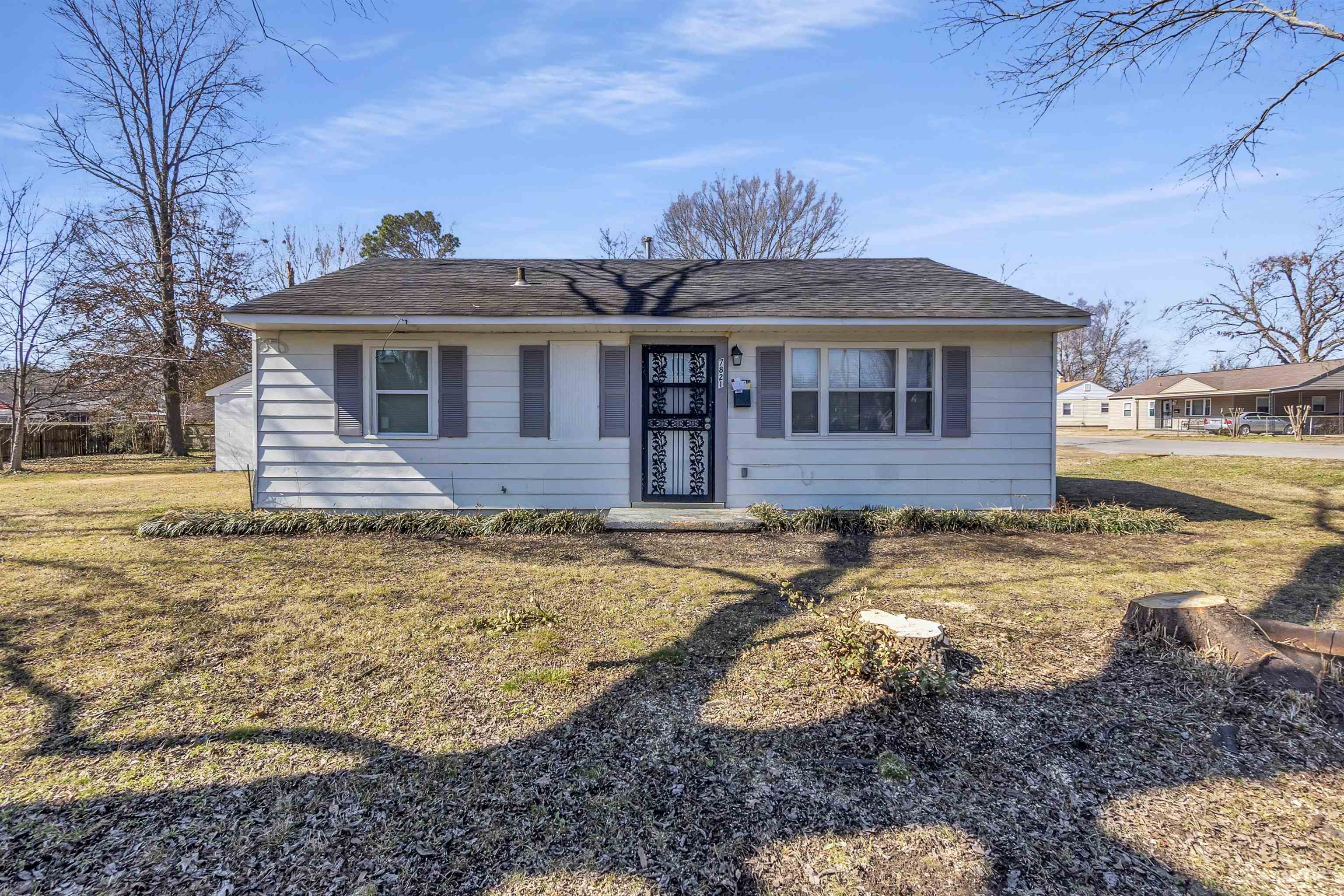 7821 Newport Road Millington, TN 38053 - Photo 9 of 18 View of front facade with a front lawn and roof with shingles