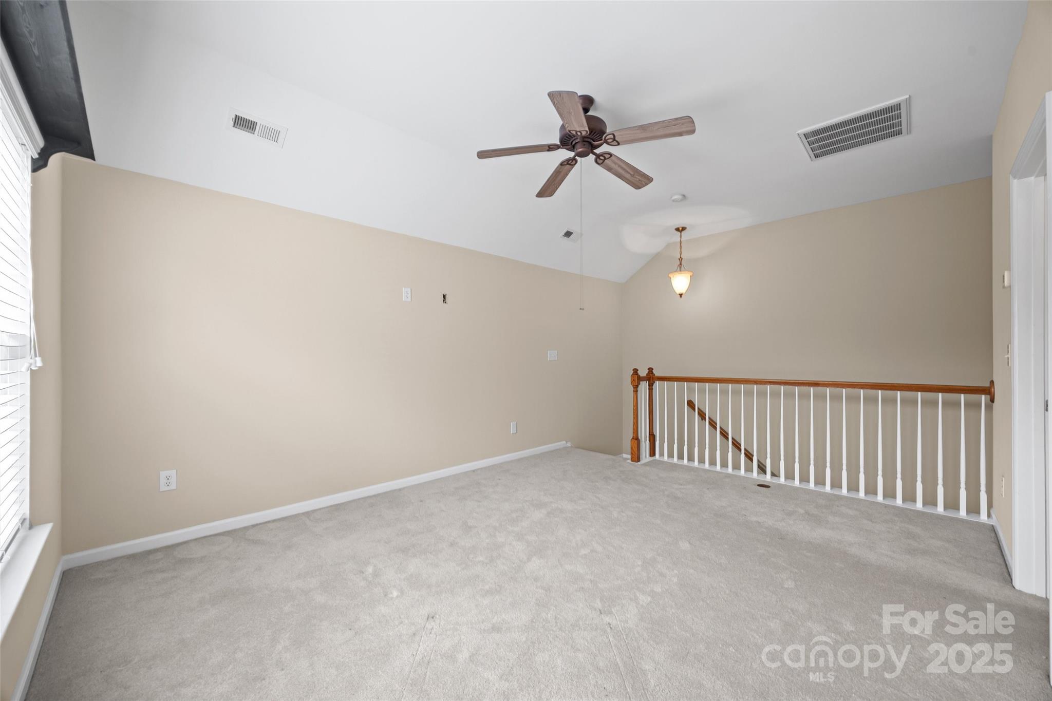 1033 Knob Creek Lane Tega Cay, SC 29708 - Photo 32 of 45 a view of a room with a ceiling fan
