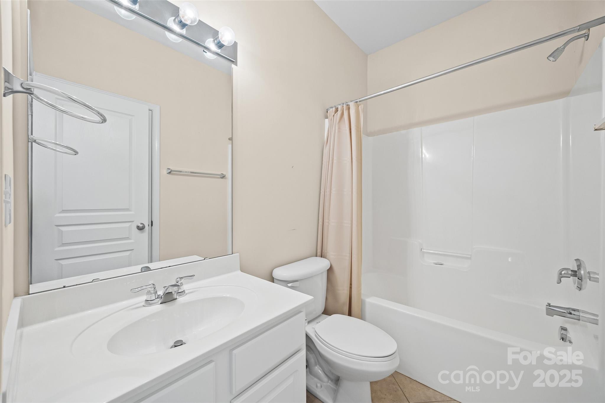 1033 Knob Creek Lane Tega Cay, SC 29708 - Photo 36 of 45 a bathroom with a sink toilet and shower