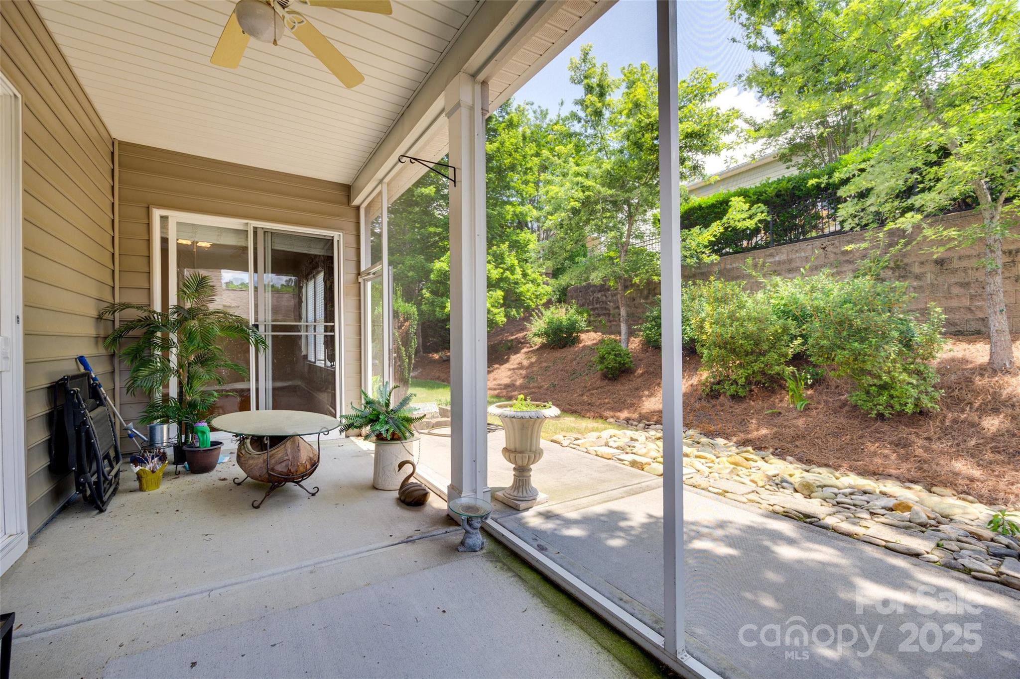 1033 Knob Creek Lane Tega Cay, SC 29708 - Photo 38 of 45 a view of a room with a porch and furniture