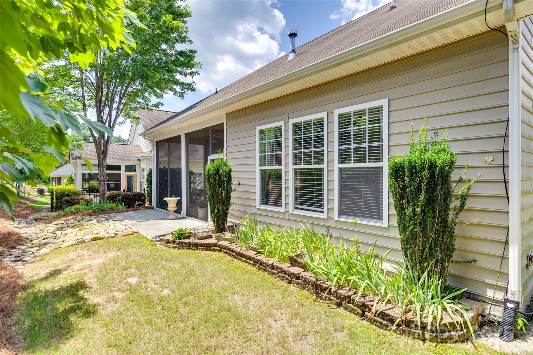 1033 Knob Creek Lane Tega Cay, SC 29708 - Photo 44 of 45 a front view of a house with a yard