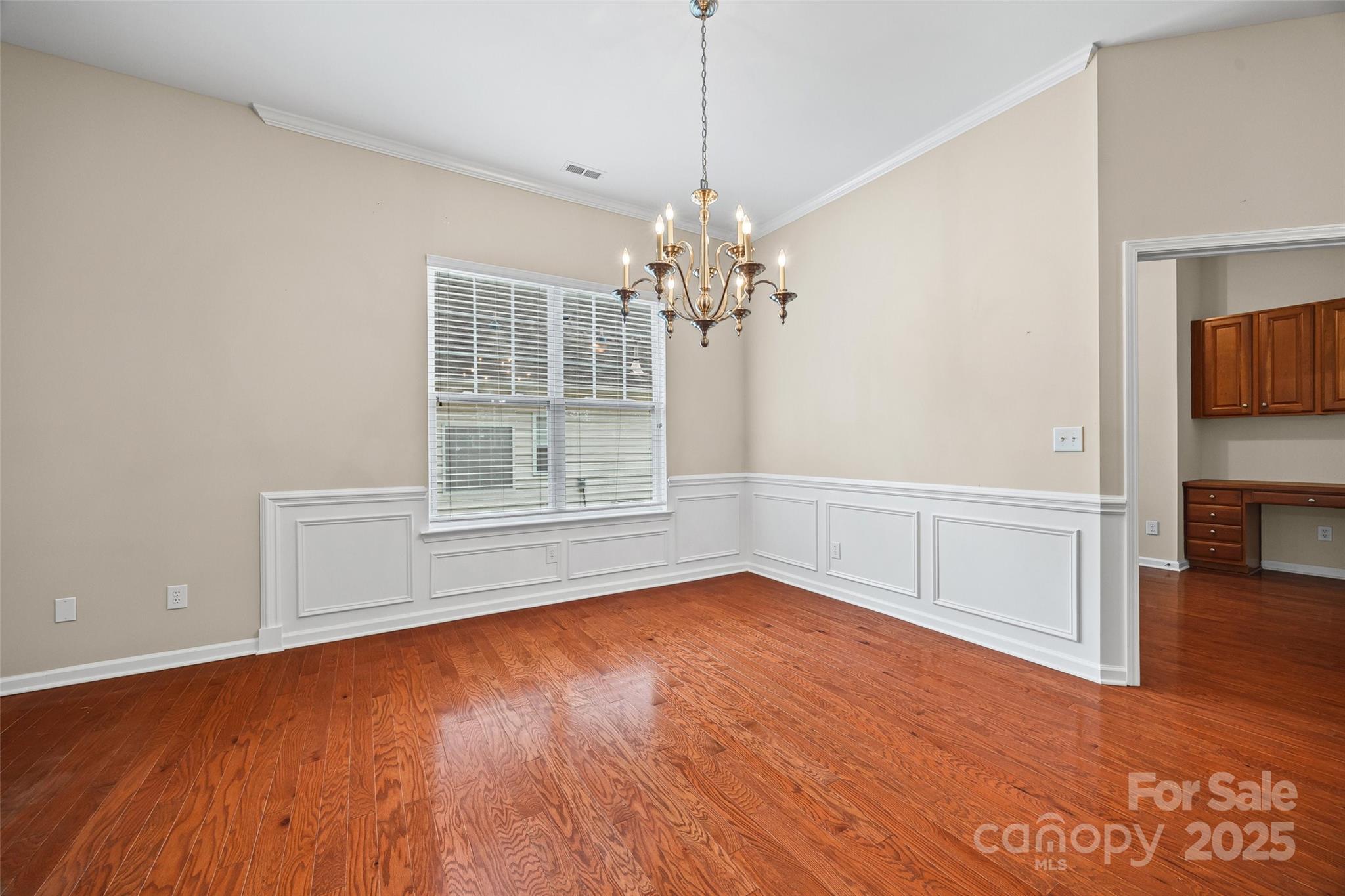 1033 Knob Creek Lane Tega Cay, SC 29708 - Photo 8 of 45 a view of livingroom with hardwood floor and window