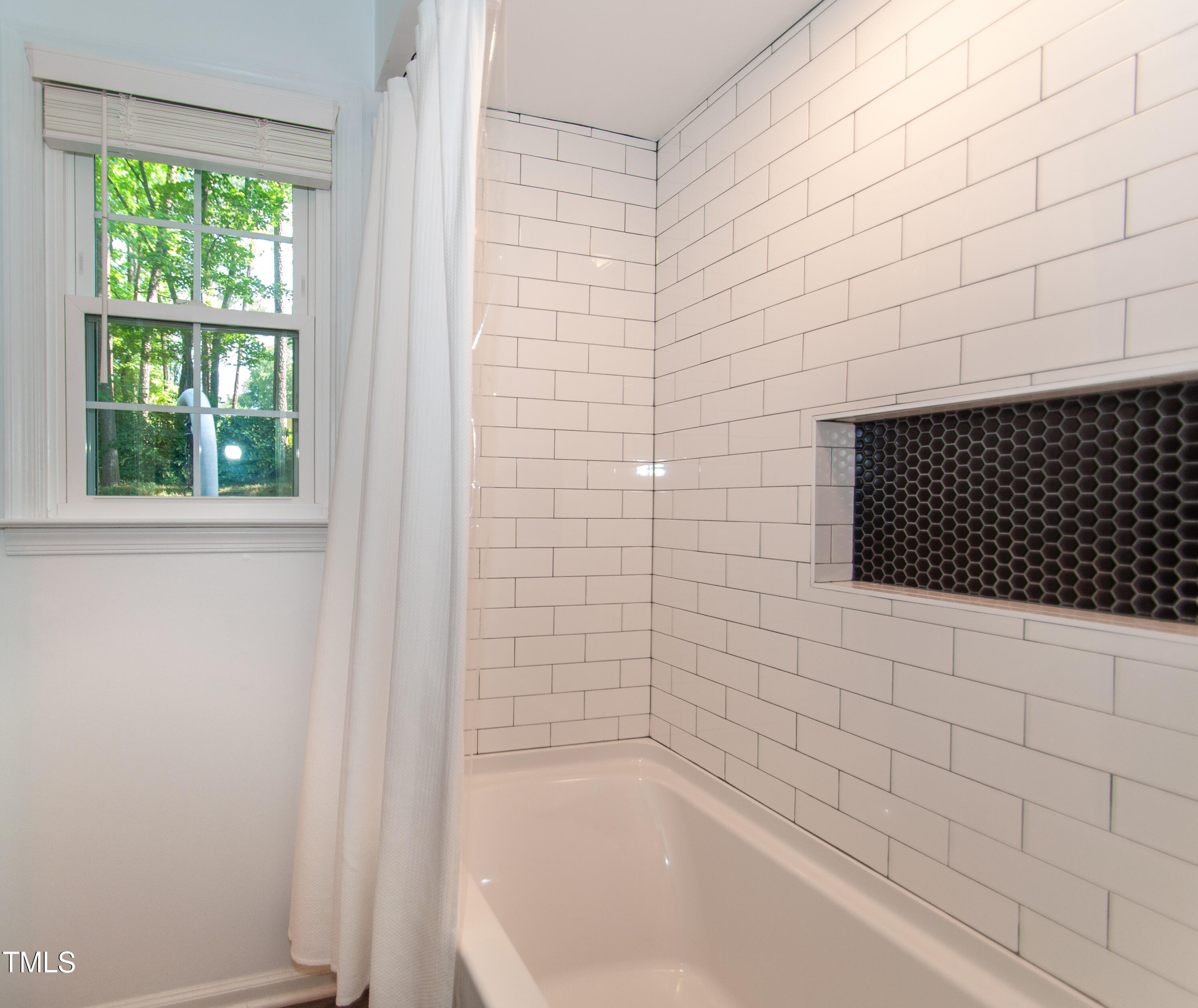 5817 Caledonia Street Raleigh, NC 27609 - Photo 15 of 46 Shower Area Master & Hall Bath