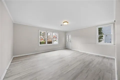 an empty room with windows