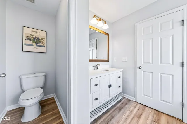 a white bath tub sitting next to a window