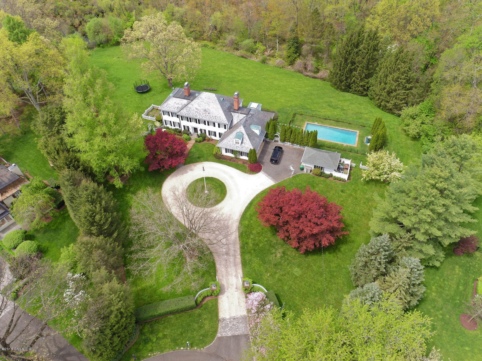 a view of a table and chairs in the garden