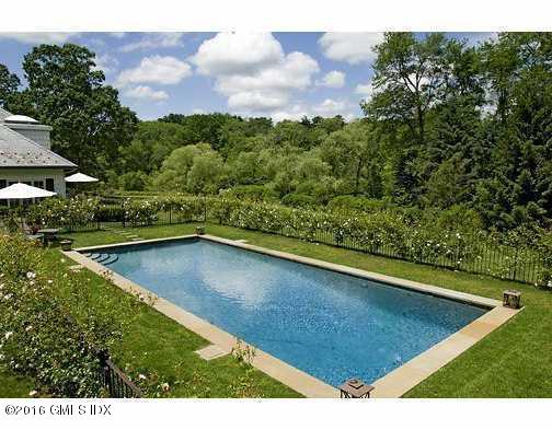 29 Lindsay Drive Greenwich, CT 06830 - Photo 11 of 17 a view of a back yard from a balcony