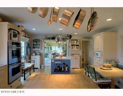 29 Lindsay Drive Greenwich, CT 06830 - Photo 8 of 17 a living room with stainless steel appliances kitchen island furniture and a kitchen view