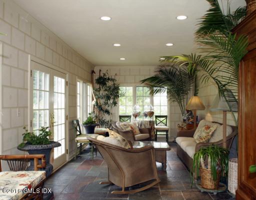 29 Lindsay Drive Greenwich, CT 06830 - Photo 10 of 17 a living room with furniture and a large window