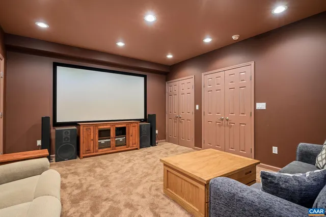 a kitchen with kitchen island granite countertop wooden floors granite counter tops and a window