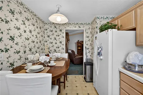 a bathroom with a sink toilet and a mirror