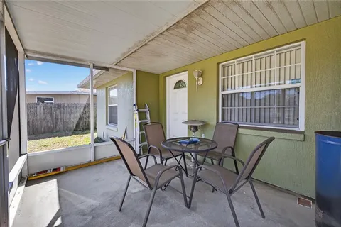 a view of an outdoor space with furniture