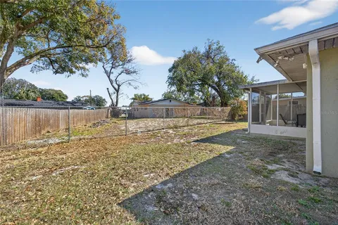 a view of backyard with green space