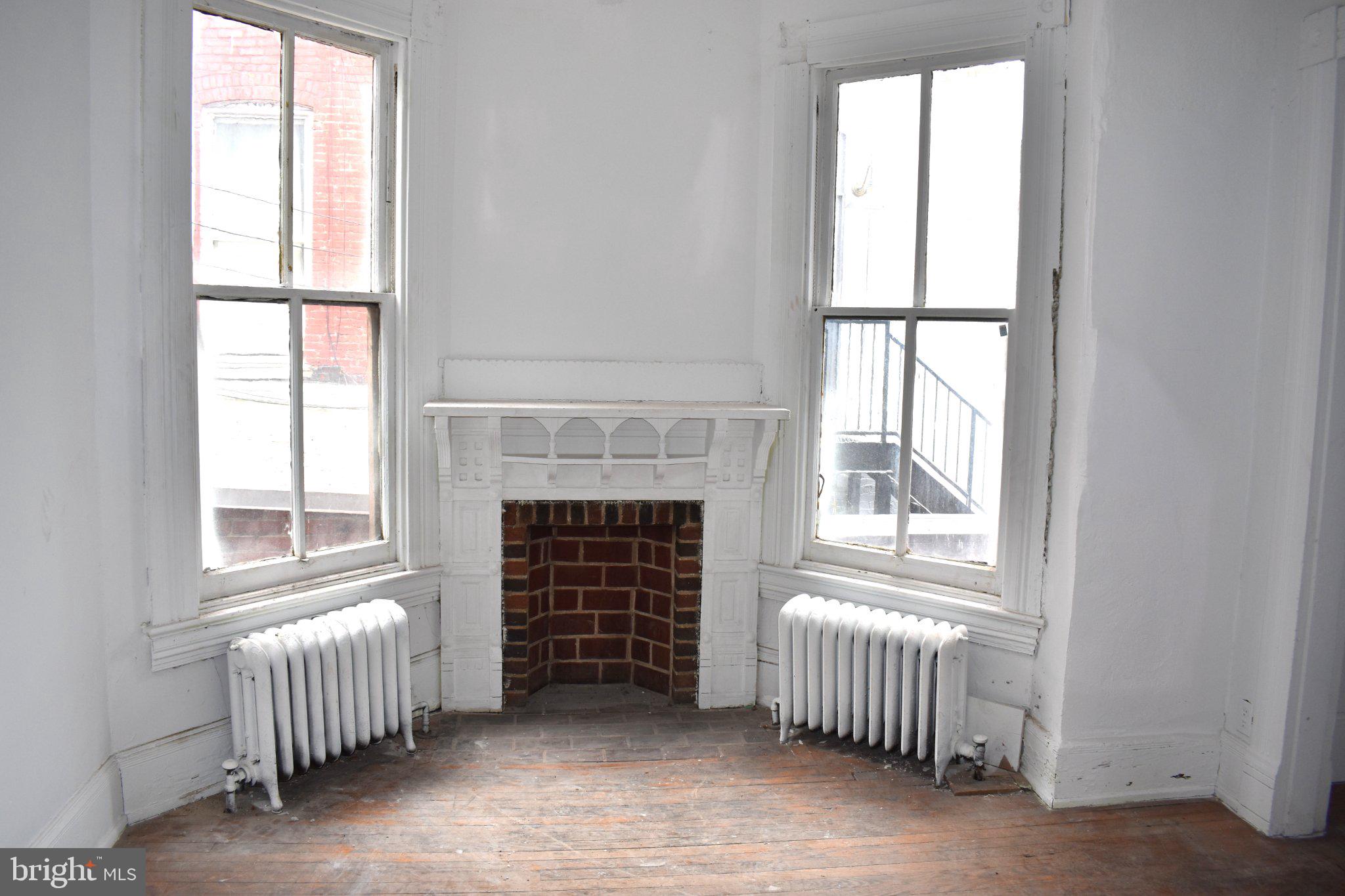1605 15th Street Northwest Washington, DC 20009 - Photo 7 of 16 Bright, airy corner with vintage charm.