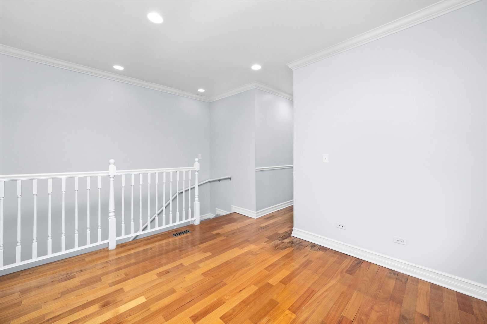 1363 East 64th Street, Unit 1 Chicago, IL 60637 - Photo 16 of 39 a view of empty room with wooden floor