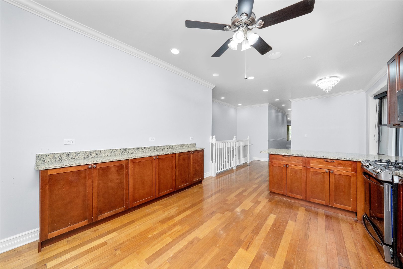 1363 East 64th Street, Unit 1 Chicago, IL 60637 - Photo 18 of 39 a view of kitchen with wooden floor and window