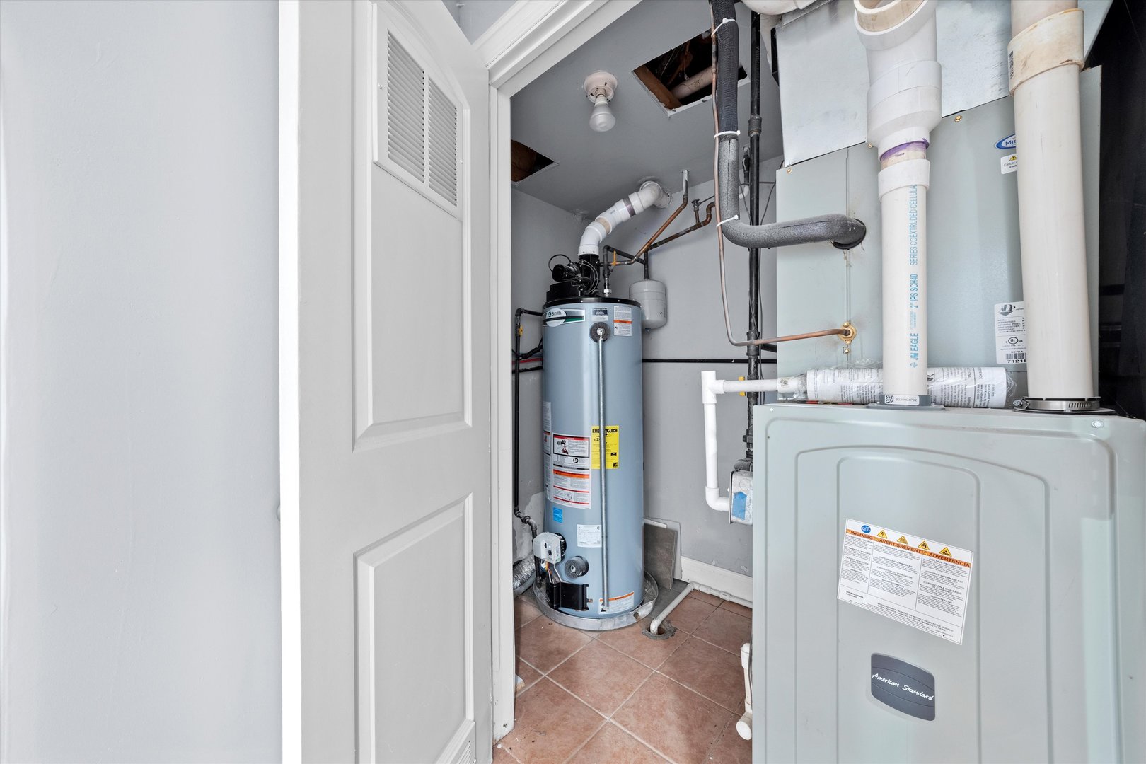 1363 East 64th Street, Unit 1 Chicago, IL 60637 - Photo 22 of 39 a utility room with dryer and washer