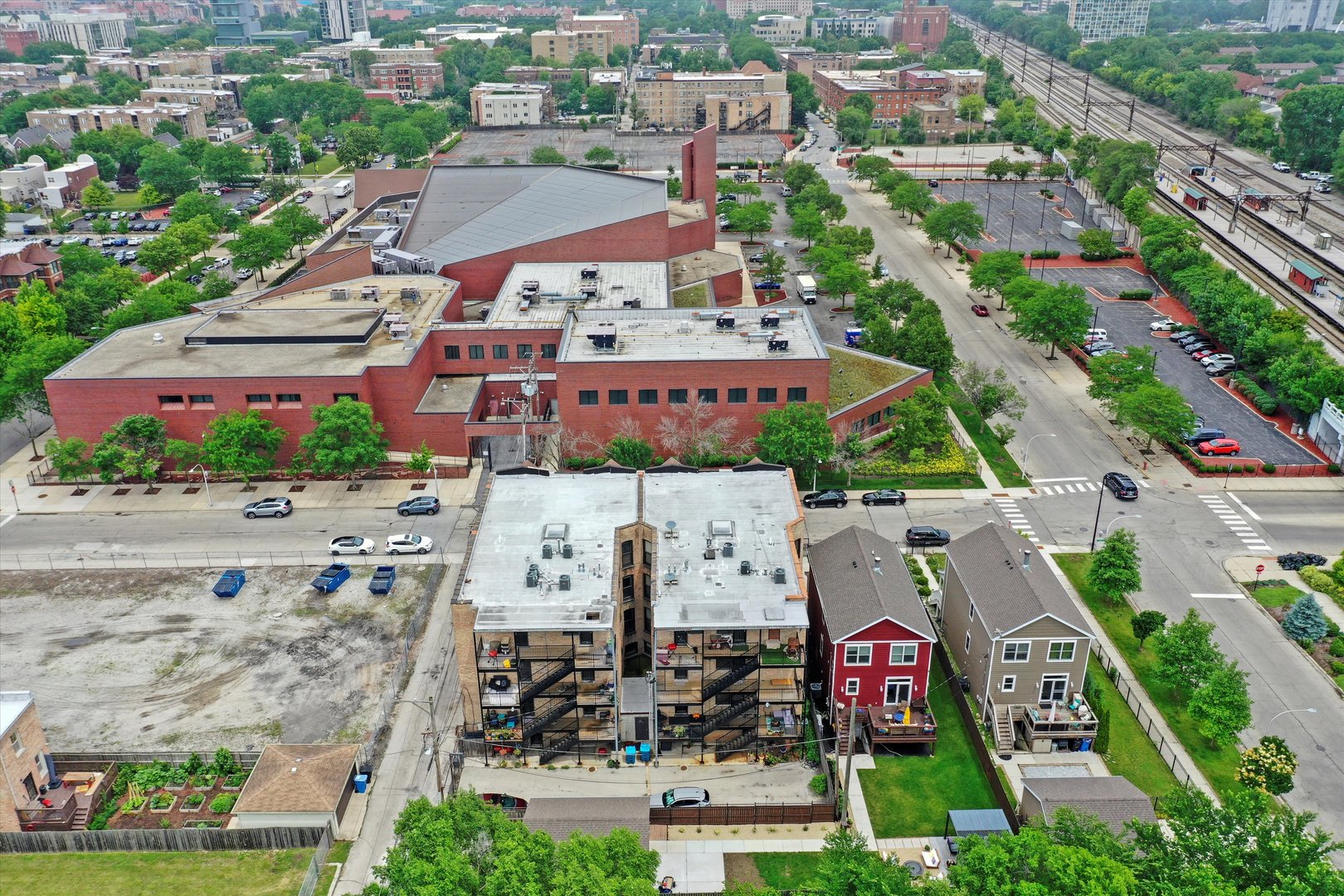 1363 East 64th Street, Unit 1 Chicago, IL 60637 - Photo 38 of 39 an aerial view of residential houses with outdoor space