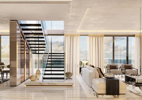 a living room with furniture and a floor to ceiling window