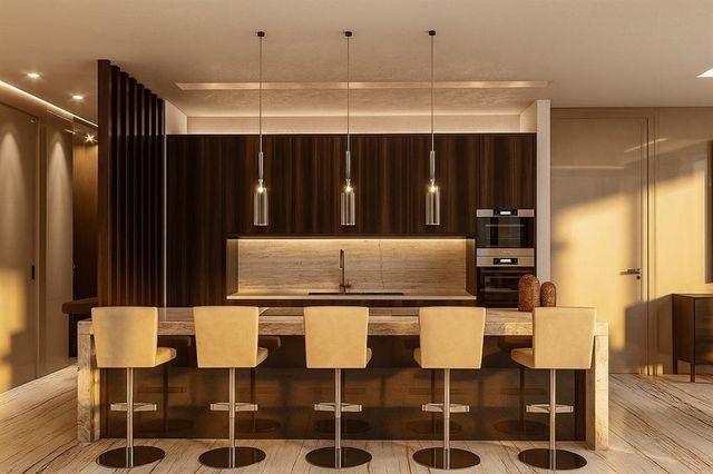 a kitchen with a dining table chairs and white cabinets