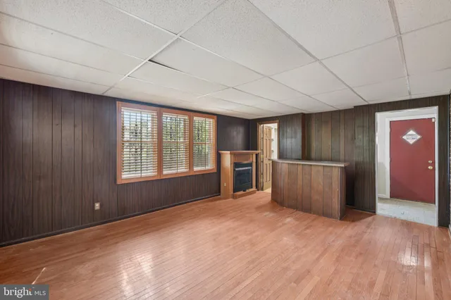 a view of a kitchen with a sink and cabinet area