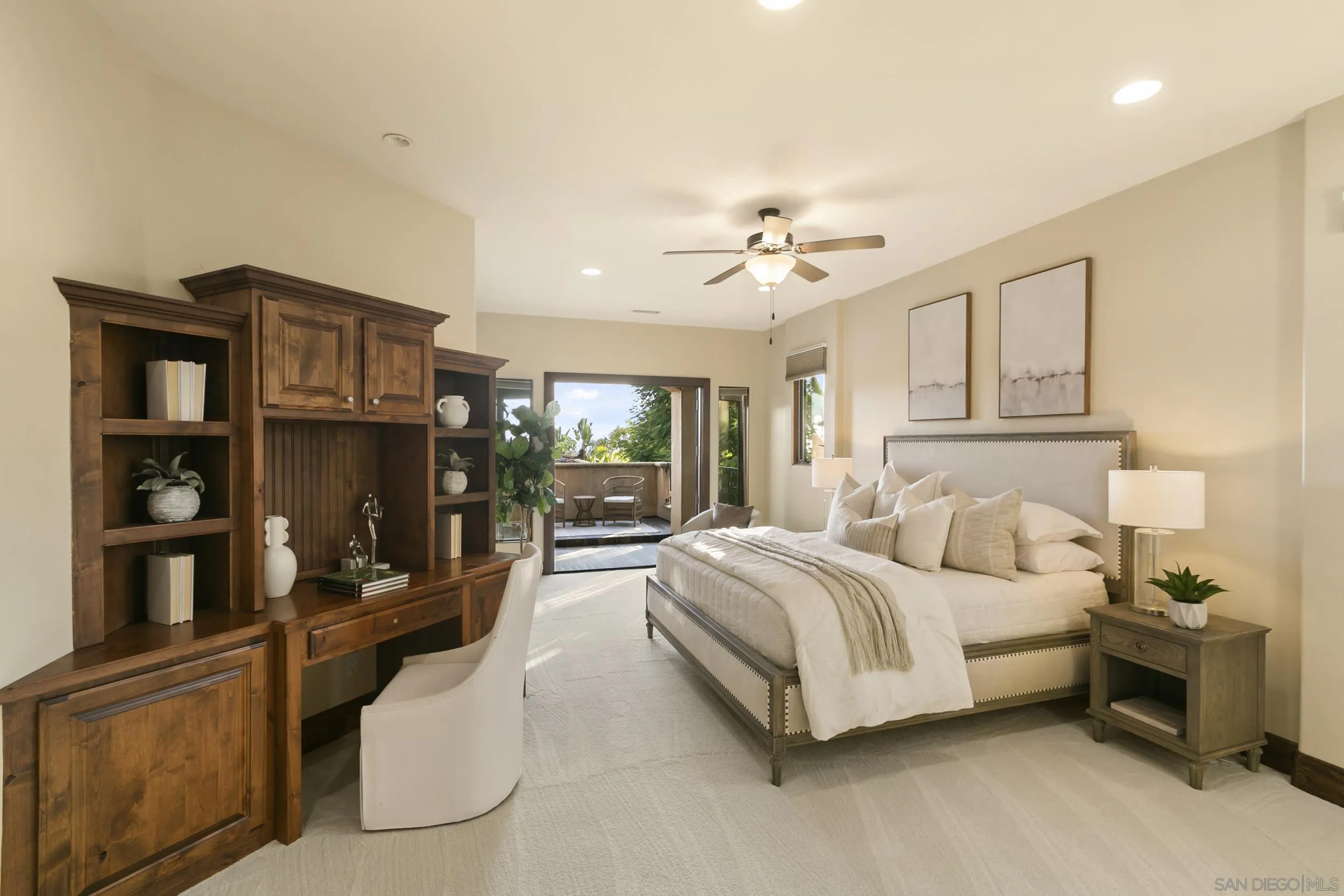 6089 Avenida Alteras Rancho Santa Fe, CA 92067 - Photo 14 of 23 a spacious bedroom with a bed a couch and dresser