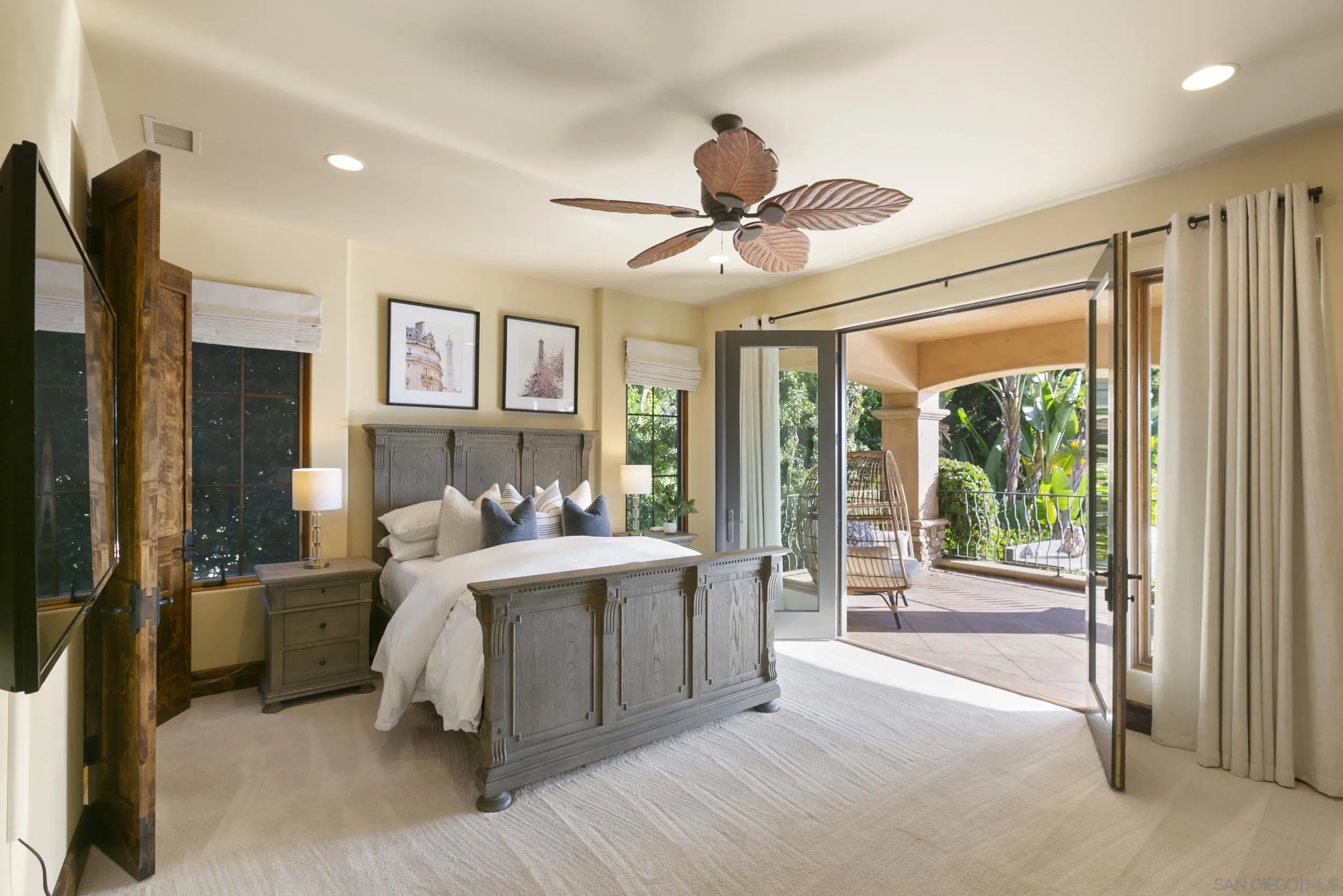 6089 Avenida Alteras Rancho Santa Fe, CA 92067 - Photo 15 of 23 a bed room with a bed and a large window