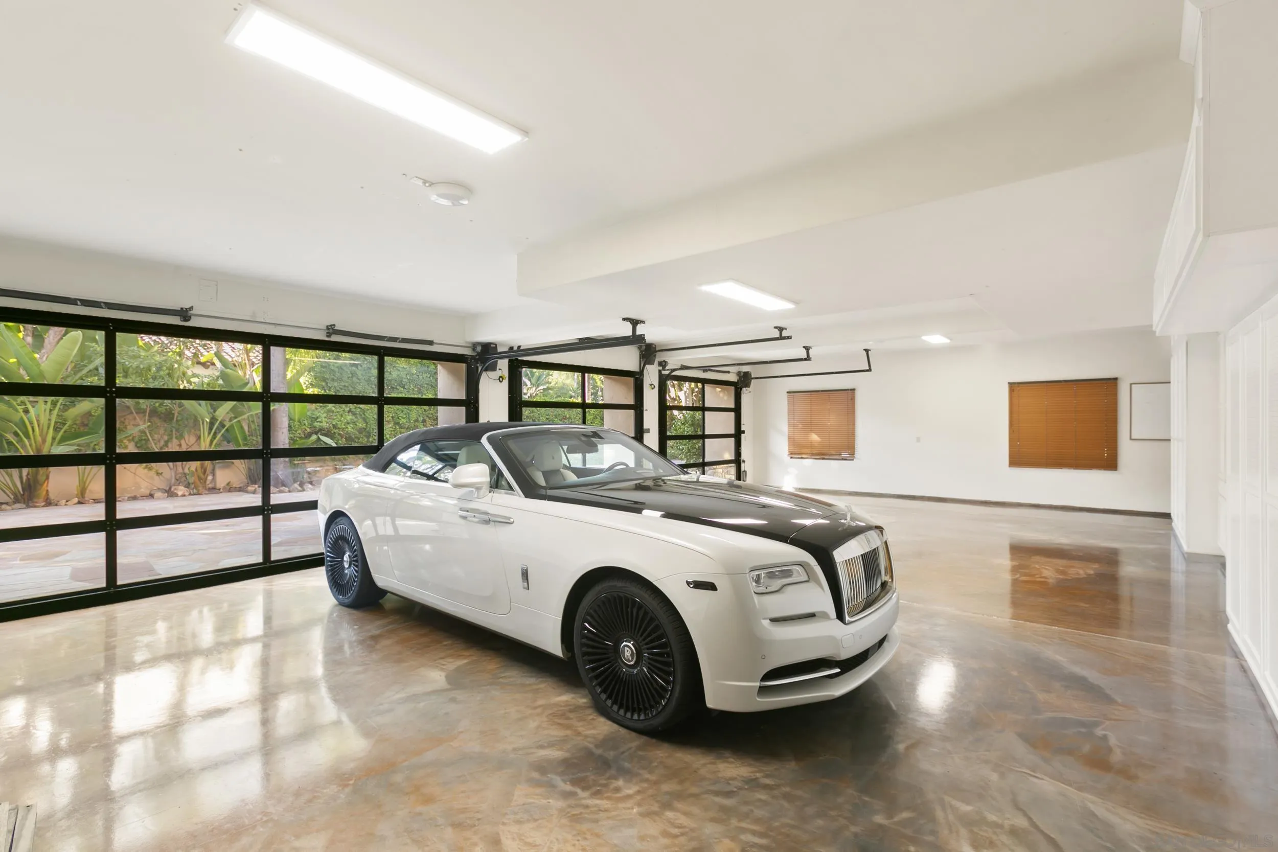 6089 Avenida Alteras Rancho Santa Fe, CA 92067 - Photo 18 of 23 a spacious bedroom with a bed and a large window