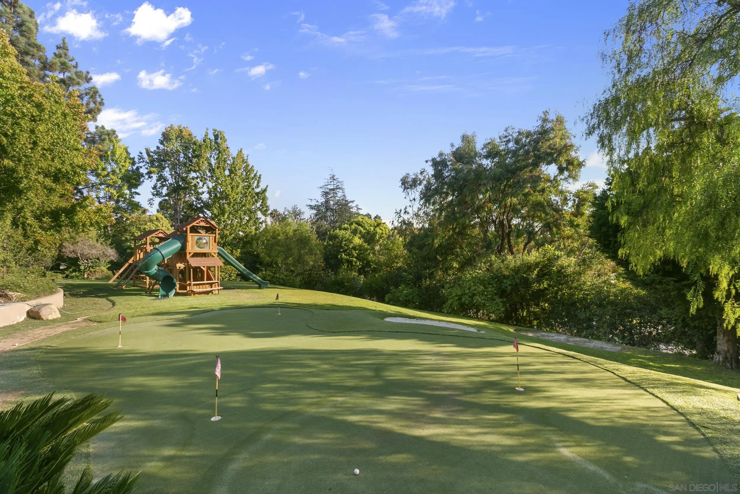 6089 Avenida Alteras Rancho Santa Fe, CA 92067 - Photo 21 of 23 a view of a playground with basketball court