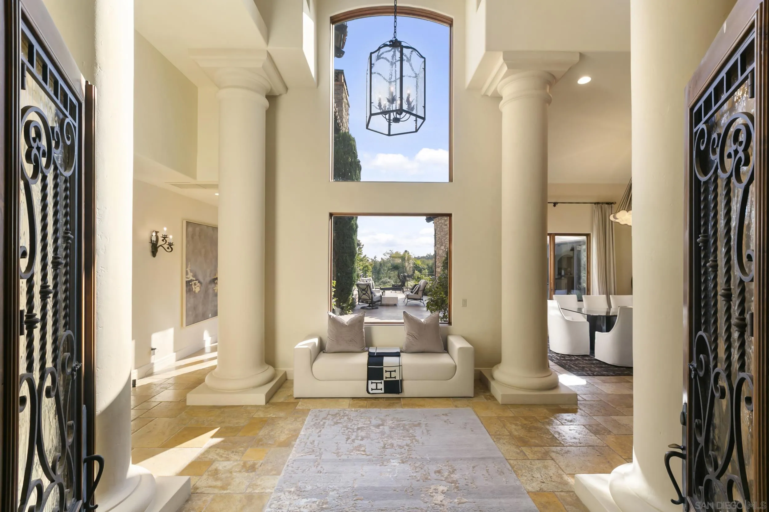 6089 Avenida Alteras Rancho Santa Fe, CA 92067 - Photo 4 of 23 a living room with furniture and a painting on the wall