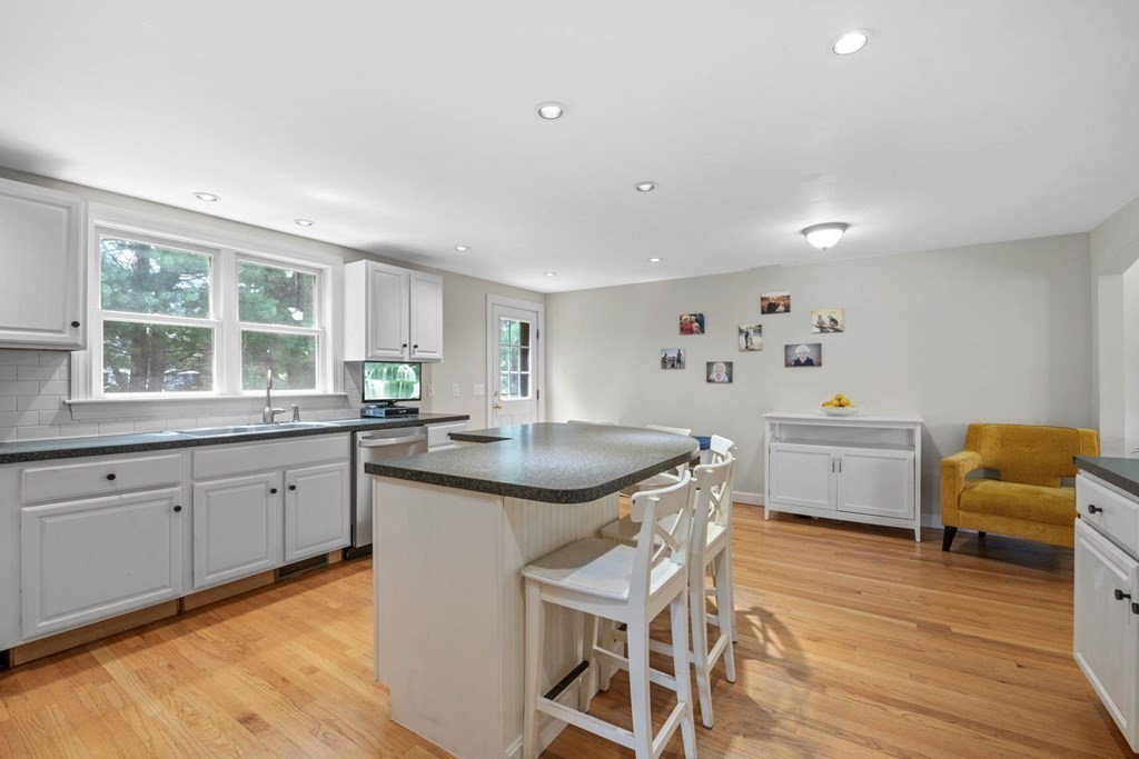 40 Pickwick Road Marblehead, MA 01945 - Photo 12 of 32 a kitchen with granite countertop furniture and a dining table