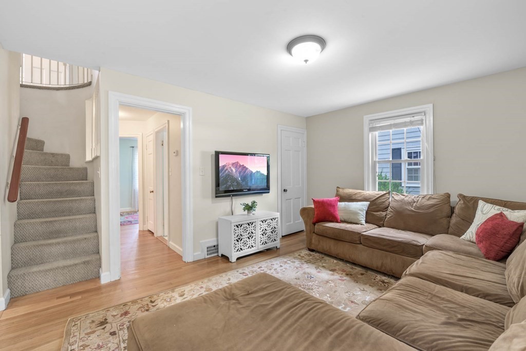 40 Pickwick Road Marblehead, MA 01945 - Photo 16 of 32 a living room with furniture and a flat screen tv
