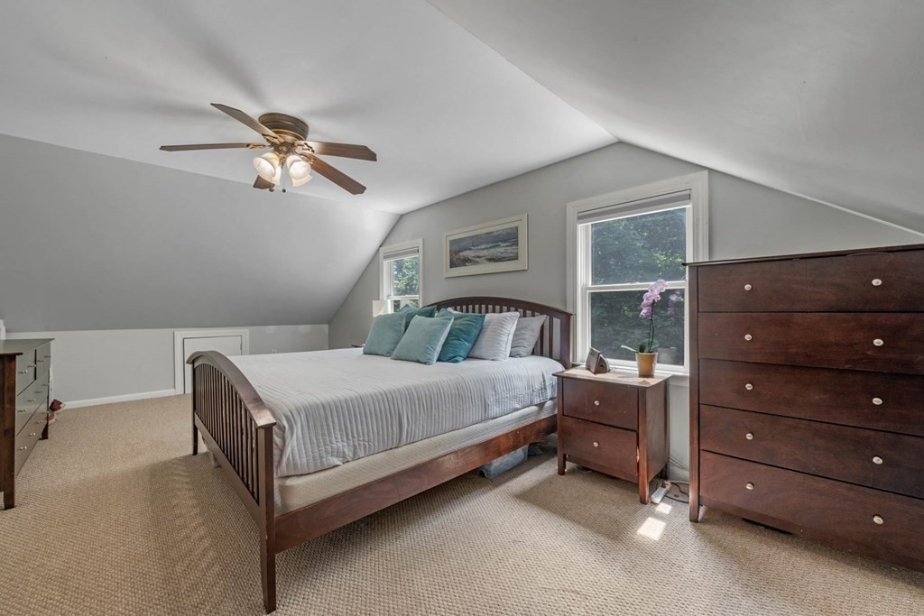 40 Pickwick Road Marblehead, MA 01945 - Photo 21 of 32 a bed room with a bed and a mirror