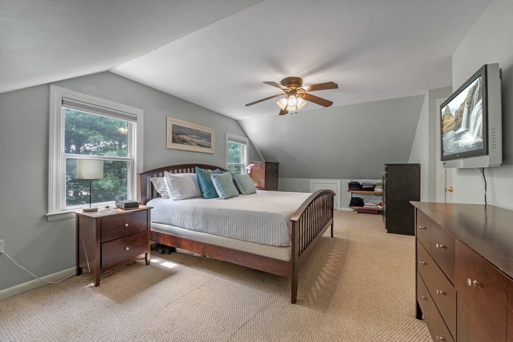 40 Pickwick Road Marblehead, MA 01945 - Photo 22 of 32 a bedroom with a bed dresser and a window