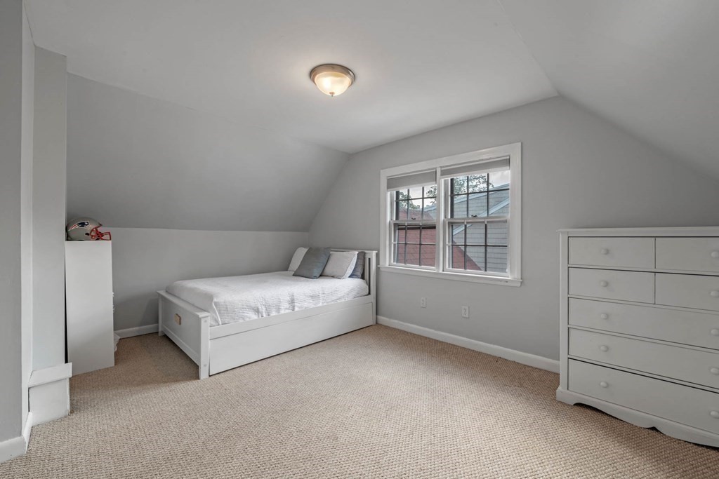 40 Pickwick Road Marblehead, MA 01945 - Photo 29 of 32 a bedroom with a bed and a window