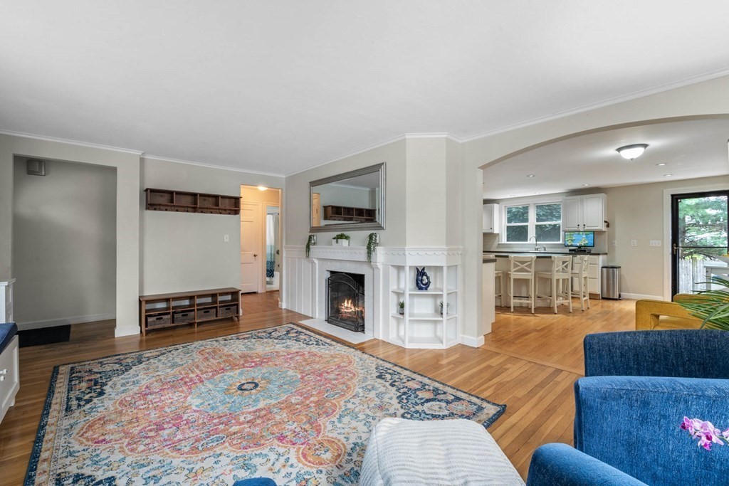 40 Pickwick Road Marblehead, MA 01945 - Photo 8 of 32 a living room with furniture and a fireplace