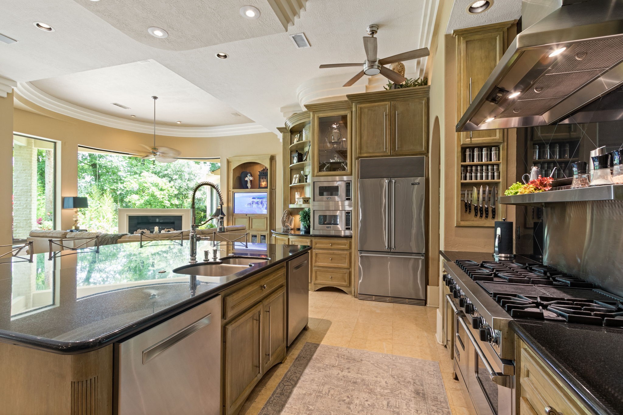 17511 Seidel Road Tomball, TX 77377 - Photo 19 of 49 a kitchen with stainless steel appliances granite countertop a stove and a refrigerator