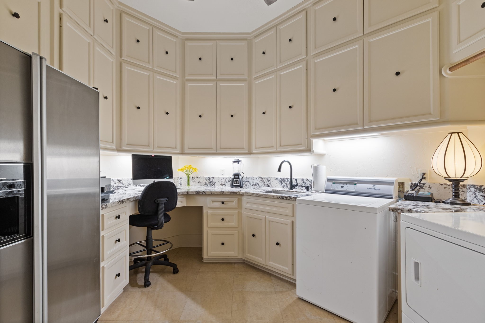 17511 Seidel Road Tomball, TX 77377 - Photo 37 of 49 a kitchen with refrigerator and cabinets