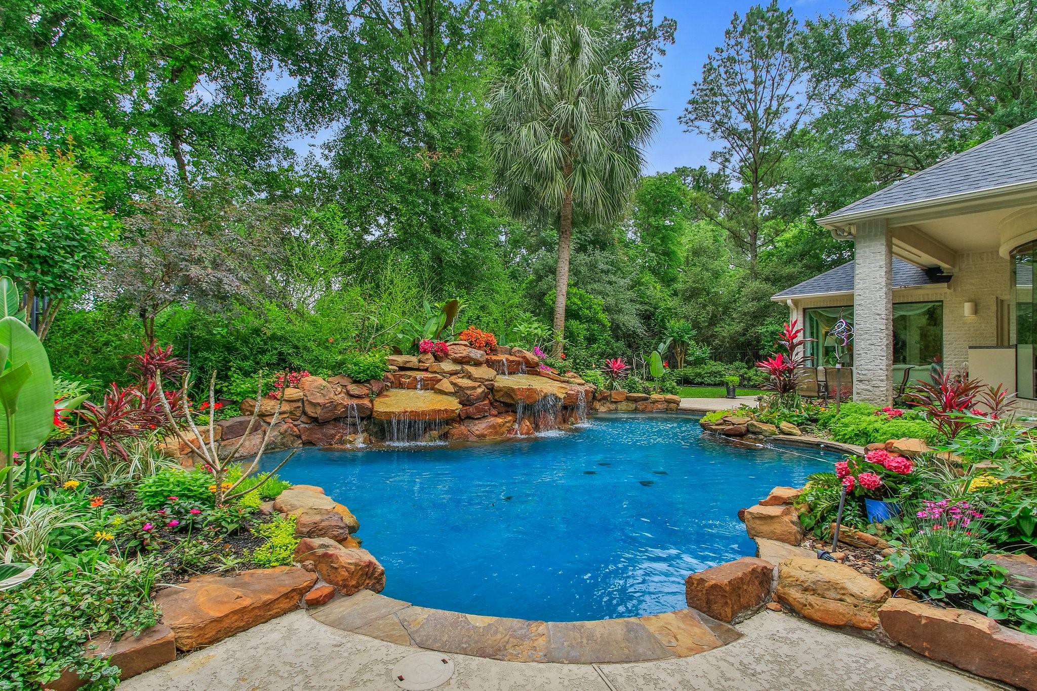 17511 Seidel Road Tomball, TX 77377 - Photo 5 of 49 a front view of a house with a yard and a garden