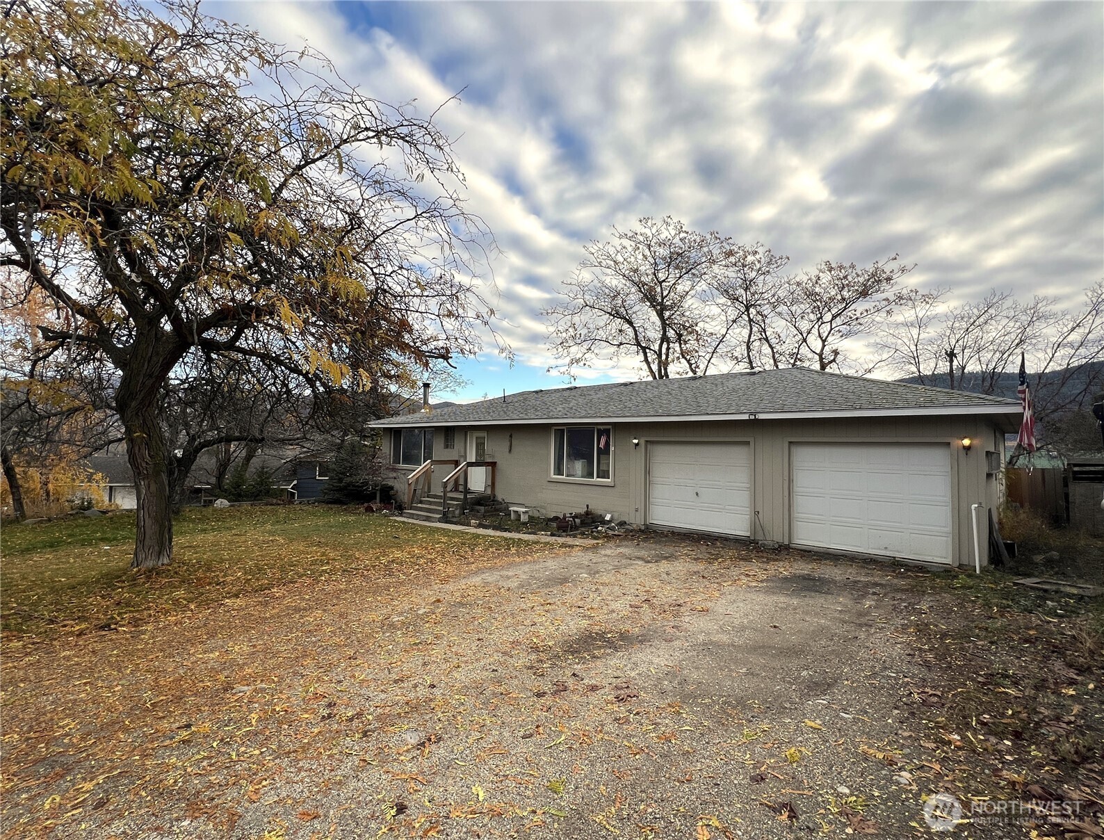 a house with trees in the background