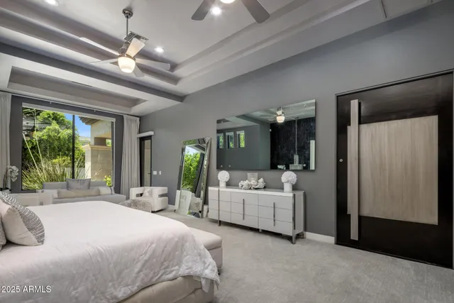 a bathroom with a double vanity sink a mirror and a shower