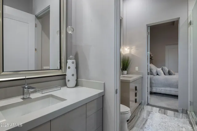 a front view of a house with swimming pool having outdoor seating