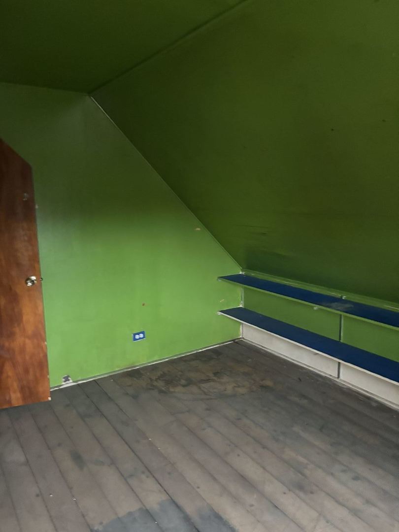 2469 East 74th Street Chicago, IL 60649 - Photo 18 of 24 a view of a room with wooden floor and a window