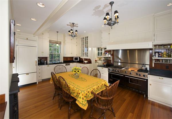 15 Hamlins Crossing West Dover, MA 02030 - Photo 17 of 23 a very nice looking kitchen with a table chairs stove and cabinets