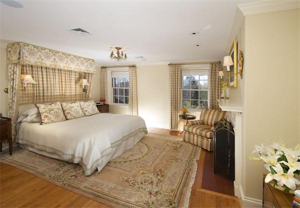 15 Hamlins Crossing West Dover, MA 02030 - Photo 19 of 23 a bedroom with a bed and wooden floor